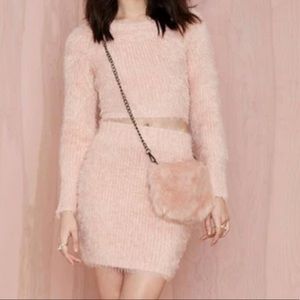 Pink fuzzy skirt comes as a matching set from revolve
